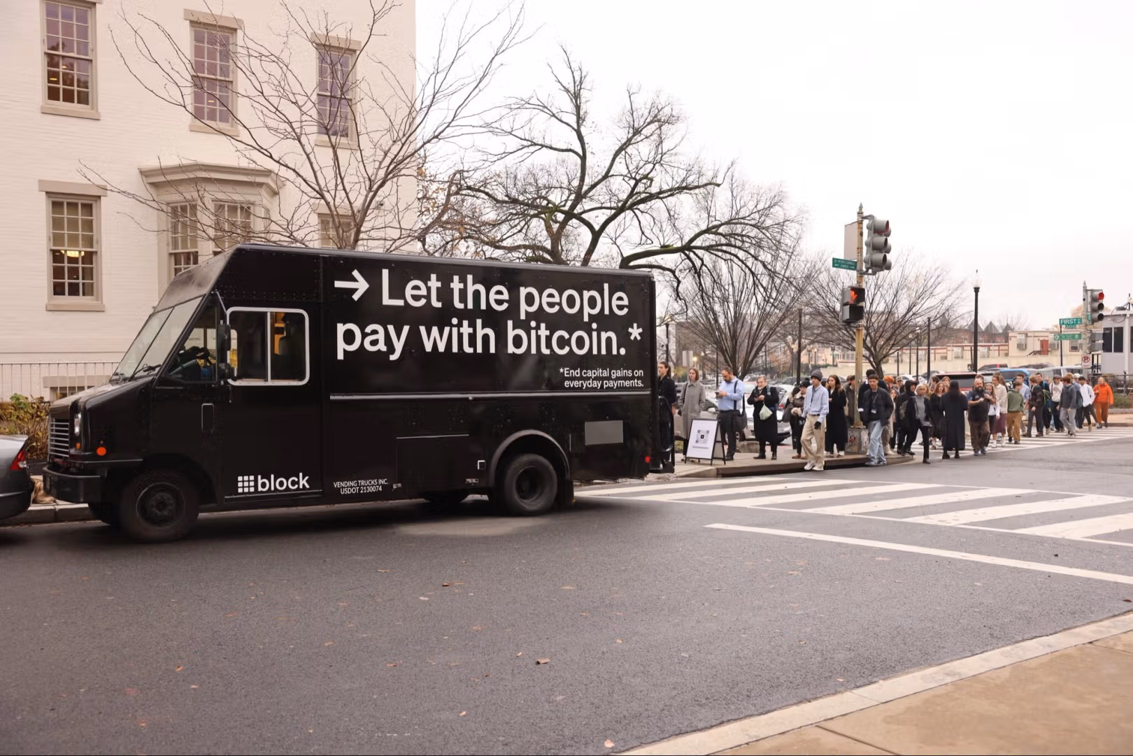 A Block truck carrying the message: let the people pay with bitcoin.